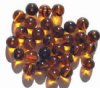 25 10mm Transparent Topaz Tortoise Round Glass Beads